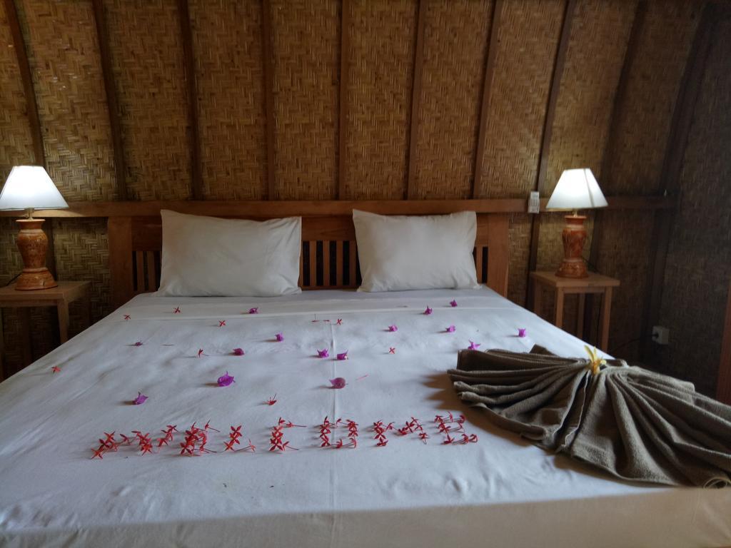 Отель Rose Bungalow Pemenang Экстерьер фото