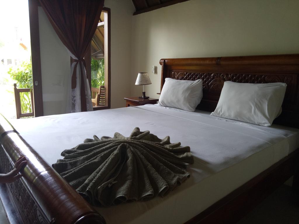 Отель Rose Bungalow Pemenang Экстерьер фото