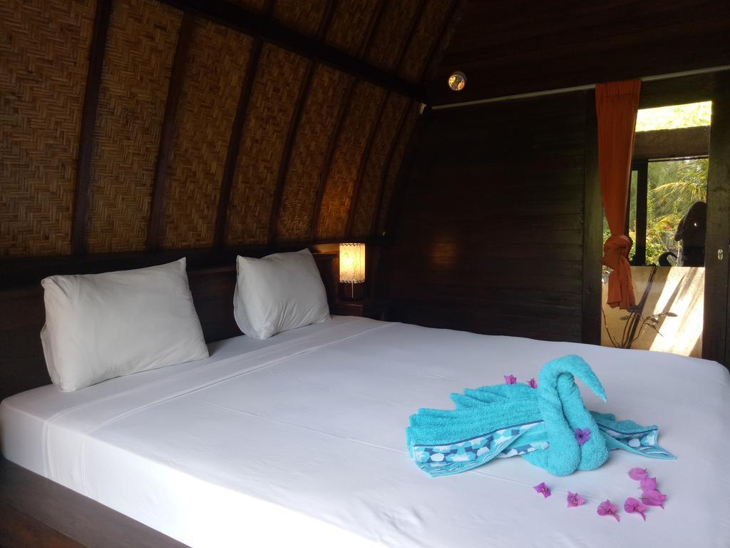 Отель Rose Bungalow Pemenang Экстерьер фото