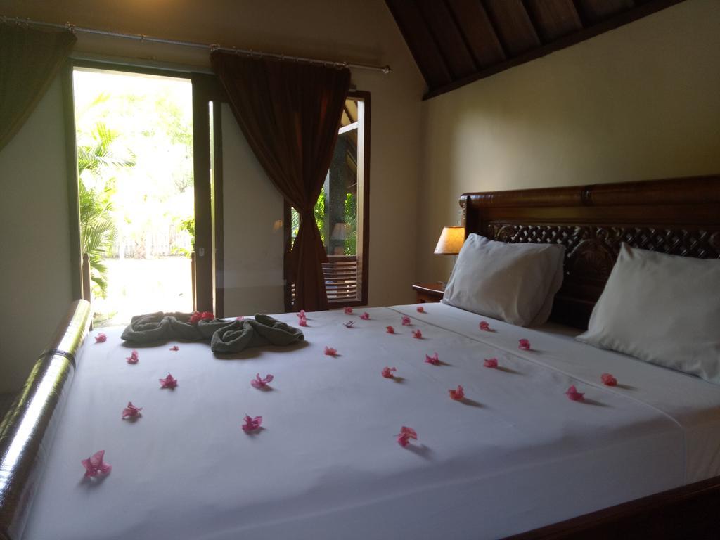 Отель Rose Bungalow Pemenang Экстерьер фото
